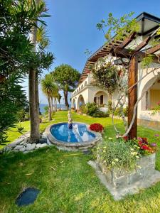 a house with a swimming pool in the yard at Casa A Colina in Porto do Son