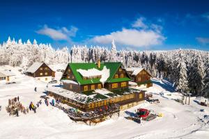 Horský hotel Paprsek a l'hivern