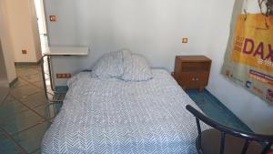 Кровать или кровати в номере Appartement 2 chambres