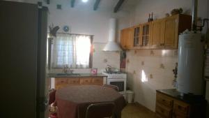 Kuchyň nebo kuchyňský kout v ubytování Canela House