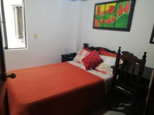 Habitaciones en Edificio Ginebra Manizales客房内的一张或多张床位