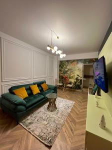Ein Sitzbereich in der Unterkunft Nivas Apartments-Palace of Culture