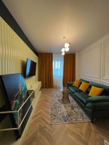 Ein Sitzbereich in der Unterkunft Nivas Apartments-Palace of Culture