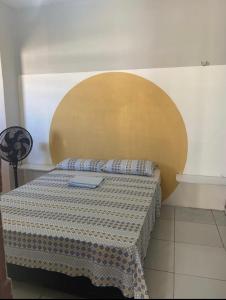 Una cama o camas en una habitación de Flat Pimenta 02- Casa Térrea
