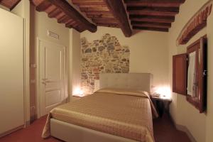 Posteľ alebo postele v izbe v ubytovaní Agriturismo San Martino