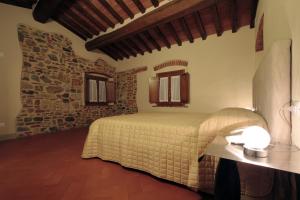 Posteľ alebo postele v izbe v ubytovaní Agriturismo San Martino