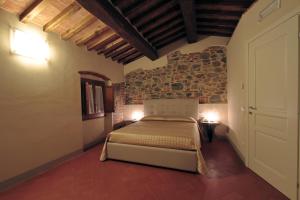 Posteľ alebo postele v izbe v ubytovaní Agriturismo San Martino