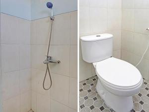 a bathroom with a toilet and a shower at SPOT ON 1711 Serayu Sumbersari Residence in Malang
