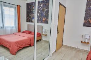 Postel nebo postele na pokoji v ubytování Ravissant appartement 2ch à la plage + 15 fotografií