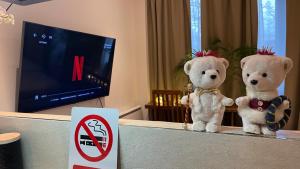 two teddy bears sitting on top of a counter at By nuit-parisienne : Superbe appartement avec SPA et terrasse privée in Villemomble