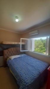 Ένα ή περισσότερα κρεβάτια σε δωμάτιο στο Casa nos ingleses