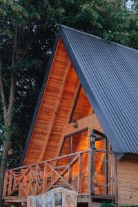 a log cabin with a metal roof at Bungalow green love sapanca in Sapanca