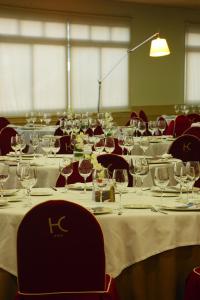 a conference room with a table with wine glasses on it at Colón Tuy in Tui