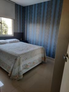 Postel nebo postele na pokoji v ubytování Apto com conforto que você precisa.
