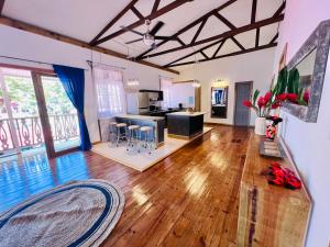 a living room with a pool in the middle of it at Casa Le Parc - Main Street in Bocas del Toro