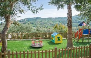 a park with a playground with a slide and a play structure at Lavanda trilo in Caramagna Ligure