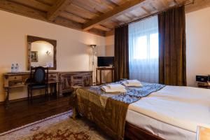Postel nebo postele na pokoji v ubytování Hotel Marysin Dwór