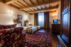 Postel nebo postele na pokoji v ubytování Hotel Marysin Dwór