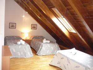 Cama o camas de una habitación en Apartament Ca de Gallisca