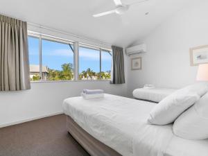 Ένα ή περισσότερα κρεβάτια σε δωμάτιο στο 5 9 Barbados Crescent Noosaville