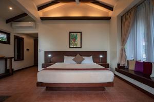 Letto o letti in una camera di Island View Beachfront Resort
