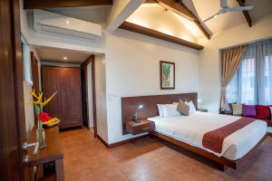 Letto o letti in una camera di Island View Beachfront Resort