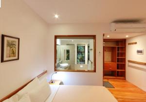 Letto o letti in una camera di Island View Beachfront Resort