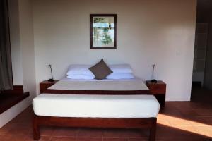 Letto o letti in una camera di Island View Beachfront Resort