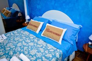 Tempat tidur dalam kamar di La Casetta di Zio Mario
