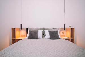 Postel nebo postele na pokoji v ubytování Luxury wellness apartment SHA