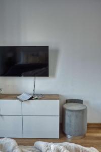TV a/nebo společenská místnost v ubytování The Smart Concierge - Damac Waves