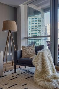 Posezení v ubytování The Smart Concierge - Damac Waves