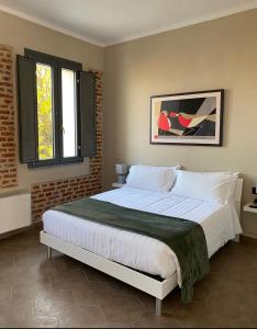 Cascina Mora Bassa客房内的一张或多张床位