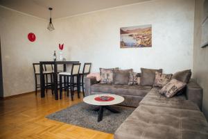 A seating area at Sea view apartment in Kotor ! Apartment Popica