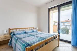 Postel nebo postele na pokoji v ubytování Alloggio Vista Mare - Parcheggio Gratis