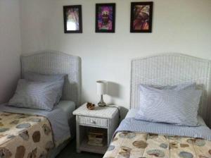 Uma área de estar em Apartment Genieten op Curacao
