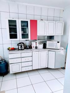 Dapur atau dapur kecil di Casa aconchegante