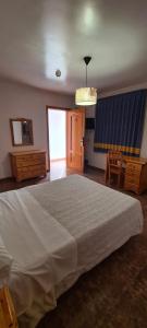 Postel nebo postele na pokoji v ubytování Complejo Turistico la Pinada