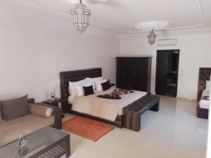 Riad le Jasmin客房内的一张或多张床位