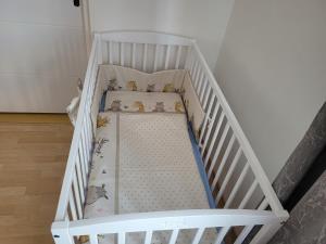 Postel nebo postele na pokoji v ubytování Apartman centrum v súkromí Reštaurácia U Jakuba