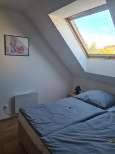 Postel nebo postele na pokoji v ubytování Stadtloft + 7 fotografií