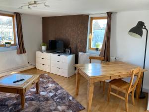 Posezení v ubytování Ferienwohnung sentio-comfortable Saalfeld