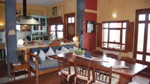 a living room with a table and a couch at Villa Rodialos in Panormos Rethymno