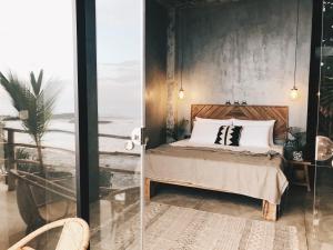 Postel nebo postele na pokoji v ubytování Morena Boutique Hotel Weligama