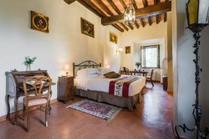 Letto o letti in una camera di Borgo Petroro