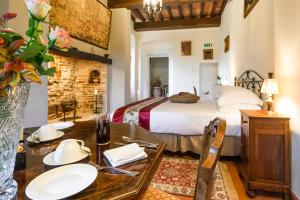 Letto o letti in una camera di Borgo Petroro