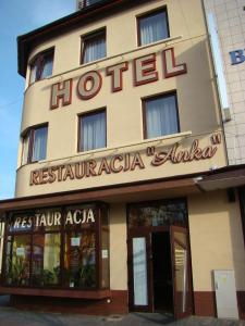 a hotel with a sign on the front of it at Hotel Anka in Słubice