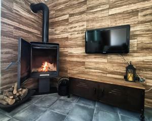 A television and/or entertainment centre at HELOHOME