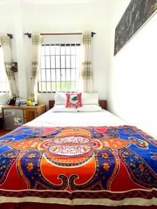 سرير أو أسرّة في غرفة في Van's House Ong Lang Beach, Phu Quoc