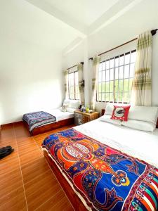 Krevet ili kreveti u jedinici u objektu Van's House Ong Lang Beach, Phu Quoc